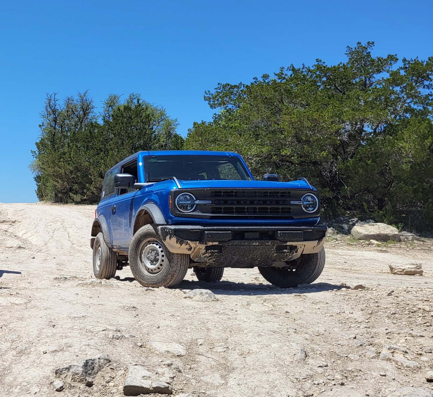Blue Ford Bronco parked outdoors